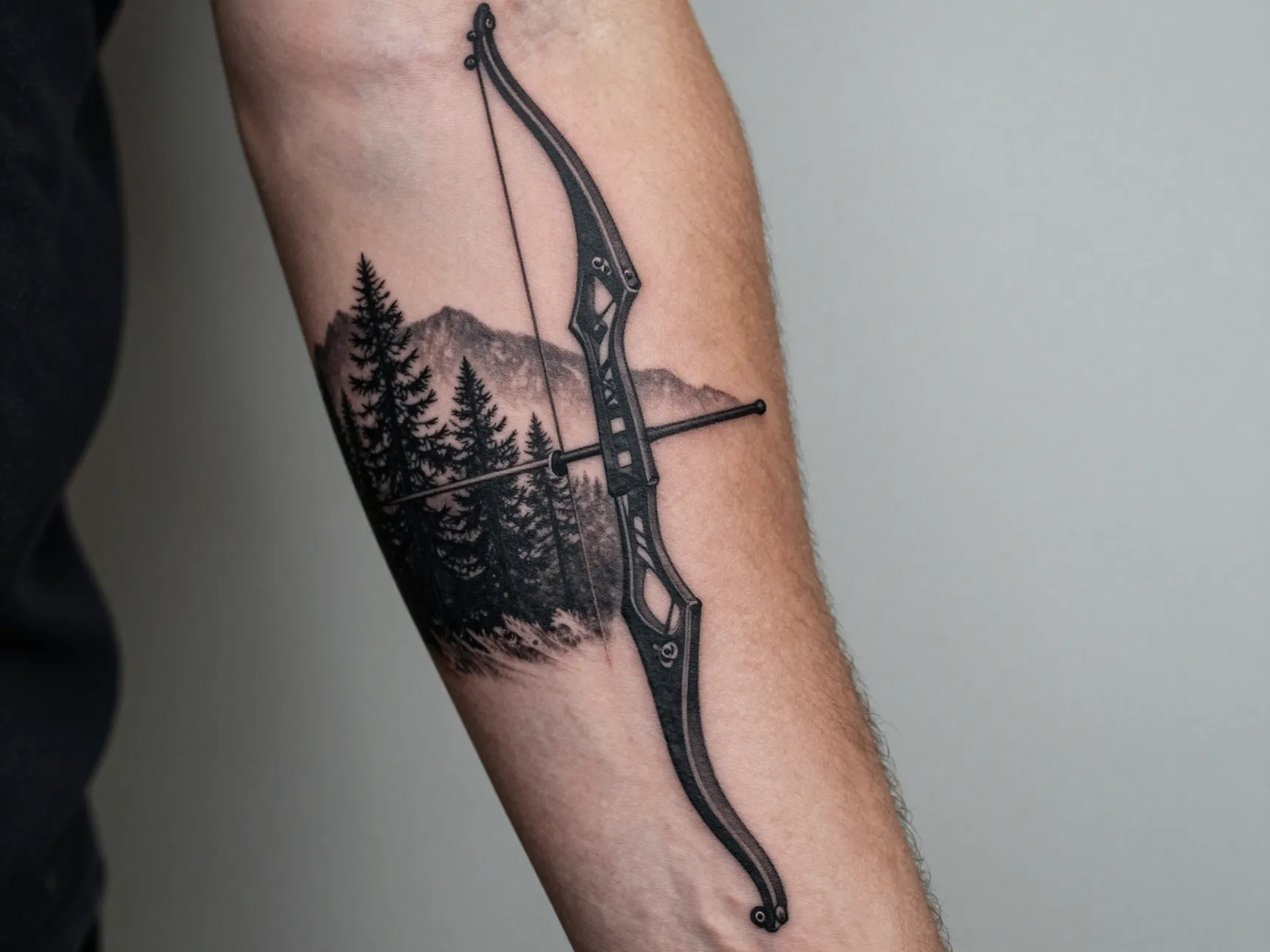 The recurve bow with forest silhouette