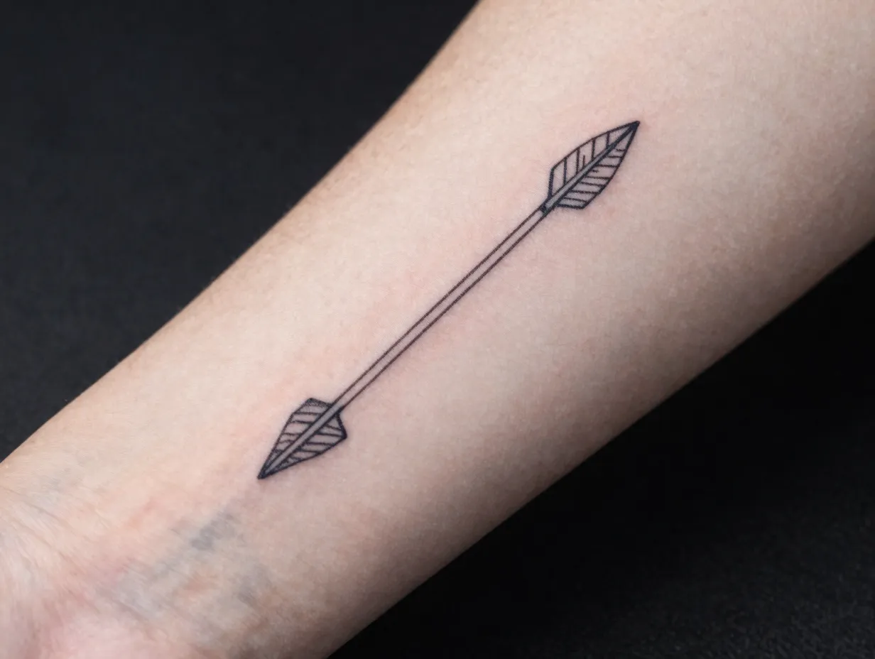 Fine line minimalist arrow tattoo