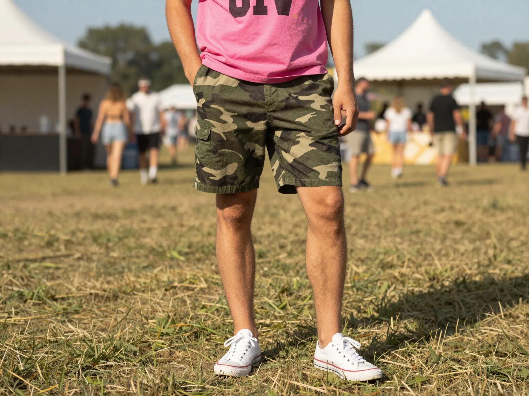 7 camo shorts and a pink graphic tee