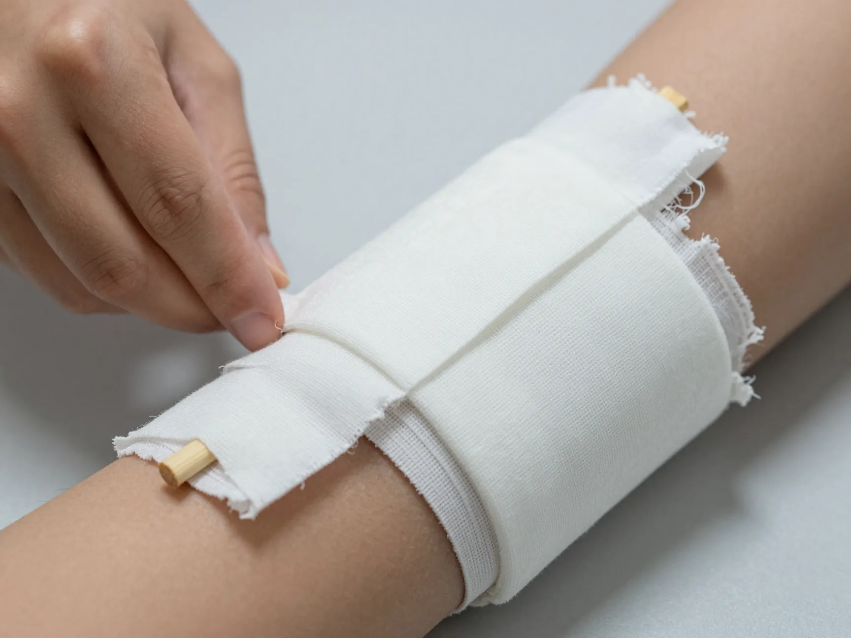 Apply pressure bandaging for wound control without a first aid kit