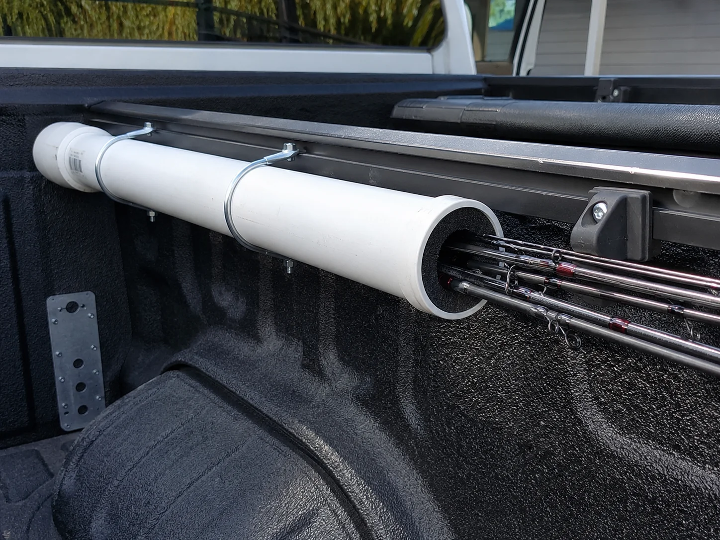 Truck bed rod holder using pvc pipe